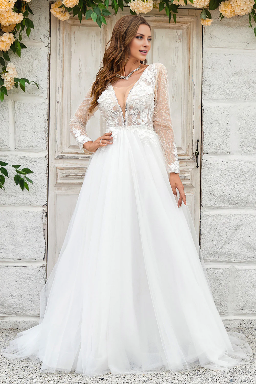 A-line deep V-neck swept trailing chiffon long sleeved wedding dress