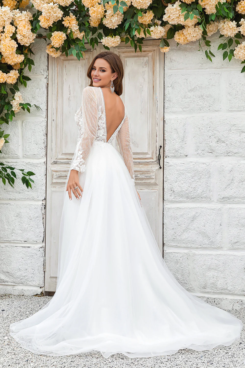 A-line deep V-neck swept trailing chiffon long sleeved wedding dress