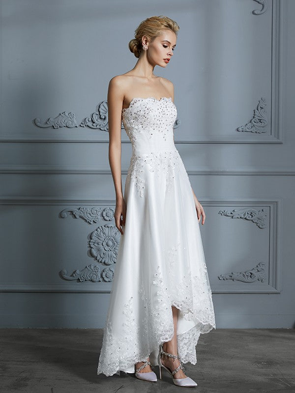 A-Line/Princess Sweetheart Sleeveless Beading Asymmetrical Tulle Wedding Dresses