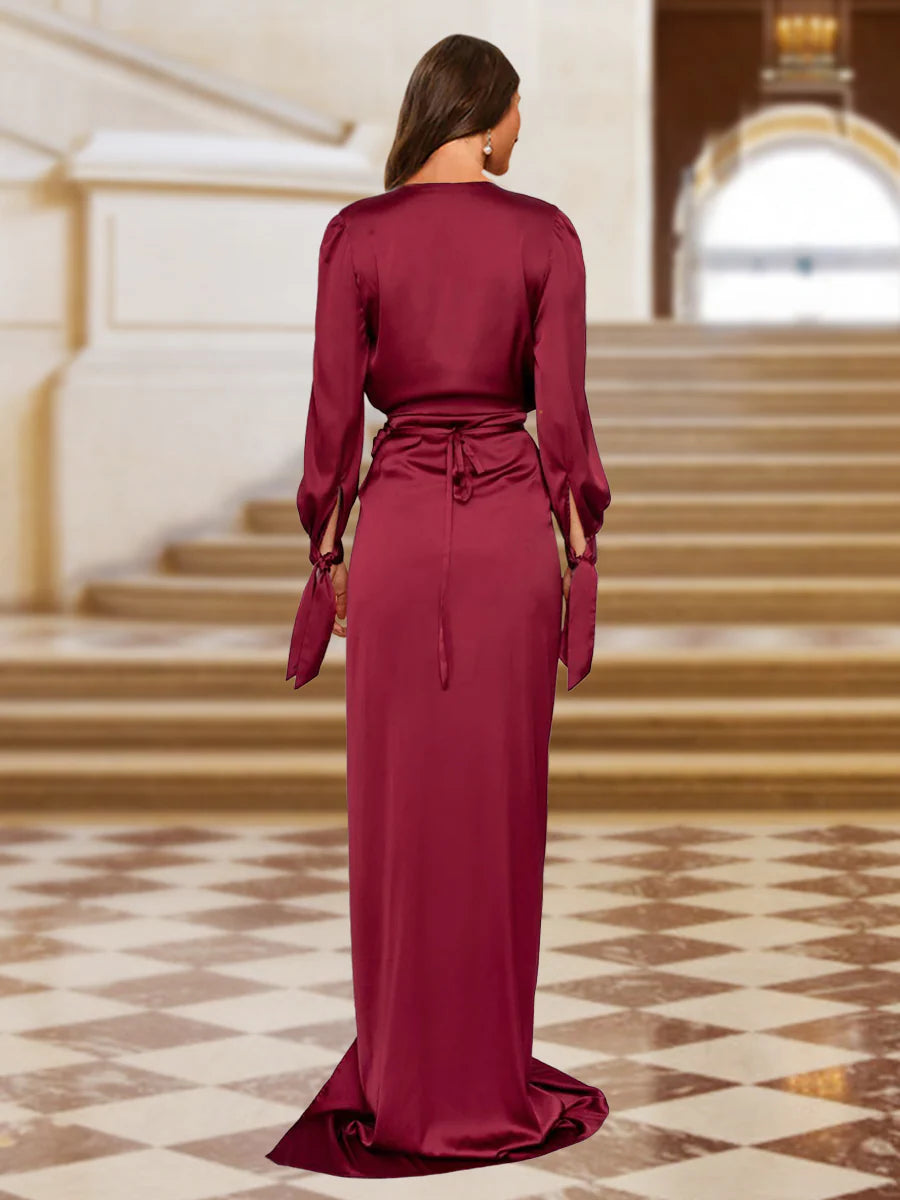 Tight fitting/cross column V-neck long sleeved pleated wrap with slit for even gown