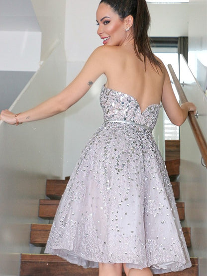 A-Line/Princess Strapless Sleeveless Sequin Knee-Length Tulle Homecoming Dresses